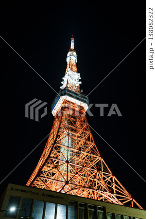 Night view of the Tokyo Tower in Minato, Tokyo, Japan. It is a lattice tower inspired by the Eiffel Tower. In Japan, the second-tallest tower is after Tokyo Skytree. Night view of the Tokyo Tower in Minato, Tokyo, Japan. It is a lattice tower inspired by the Eiffel Tower. In Japan, the second-tallest tower is after Tokyo Skytree. 138082322