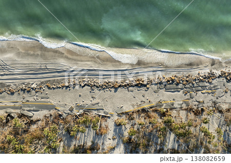 Road erosion caused by hurricane Milton storm surge. Destroyed Manasota Key road at Blind Pass Beach. Severe damage to waterfront infrastructure in Florida Road erosion caused by hurricane Milton storm surge. Destroyed Manasota Key road at Blind Pass Beach. Severe damage to waterfront infrastructure in Florida 138082659