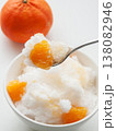 Shaved ice Kakigori granita fruit dessert for summer made of ice with juice sauce in bowl on table. 138082946