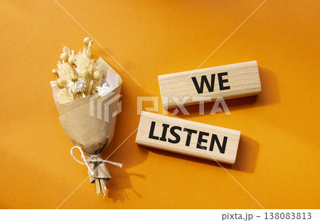 We listen symbol. Wooden blocks with words We listen. Beautiful orange background. Business and We listen concept. Copy space. We listen symbol. Wooden blocks with words We listen. Beautiful orange background. Business and We listen concept. Copy space. 138083813