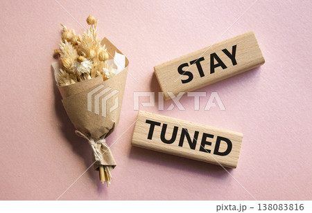Stay Tuned symbol. Wooden blocks with words Stay Tuned. Beautiful pink background. Business and Stay Tuned concept. Copy space. Stay Tuned symbol. Wooden blocks with words Stay Tuned. Beautiful pink background. Business and Stay Tuned concept. Copy space. 138083816