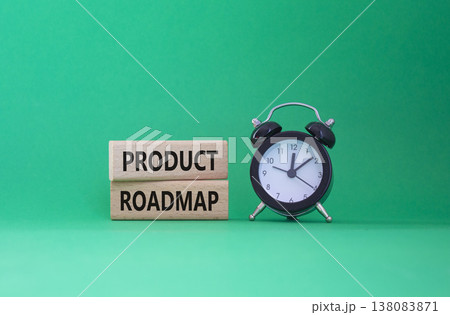 Product Roadmap symbol. Concept word Product Roadmap on wooden blocks. Beautiful green background with alarm clock. Business and Product Roadmap concept. Copy space Product Roadmap symbol. Concept word Product Roadmap on wooden blocks. Beautiful green background with alarm clock. Business and Product Roadmap concept. Copy space 138083871