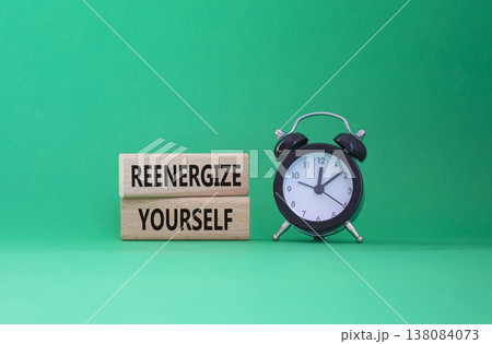 Reenergize yourself symbol. Concept words Reenergize yourself on wooden blocks. Beautiful green background with alarm clock. Mindfulness and Reenergize yourself concept. Copy space. Reenergize yourself symbol. Concept words Reenergize yourself on wooden blocks. Beautiful green background with alarm clock. Mindfulness and Reenergize yourself concept. Copy space. 138084073