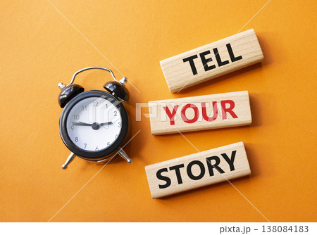 Tell your story symbol. Wooden blocks with words Tell your story. Beautiful orange background with alarm clock. Business and Tell your story concept. Copy space. Tell your story symbol. Wooden blocks with words Tell your story. Beautiful orange background with alarm clock. Business and Tell your story concept. Copy space. 138084183