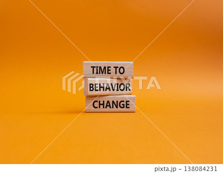 Behavior Change symbol. Wooden blocks with words Time to Behavior Change. Beautiful orange background. Business and Behavior Change concept. Copy space. 138084231