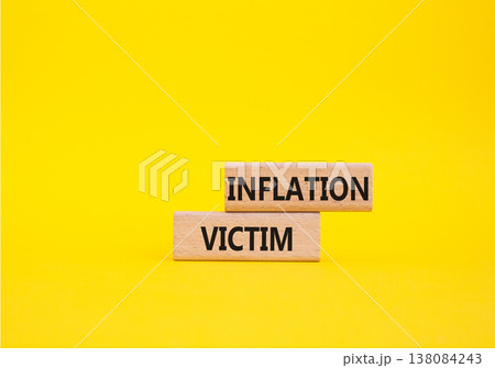Inflation Victim symbol. Wooden blocks with words Inflation Victim. Beautiful yellow background. Business and Inflation Victim concept. Copy space. Inflation Victim symbol. Wooden blocks with words Inflation Victim. Beautiful yellow background. Business and Inflation Victim concept. Copy space. 138084243