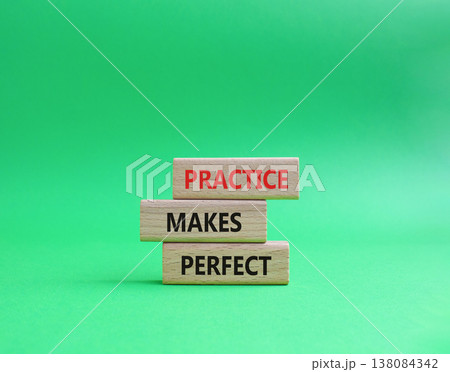 Practice Makes Perfect symbol. Wooden blocks with words Practice Makes Perfect. Beautiful green background. Business and Practice Makes Perfect concept. Copy space. 138084342