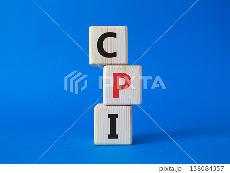 CPI - Consumer Price Index symbol. Concept word CPI on wooden cubes. Beautiful blue background. Business and CPI concept. Copy space. CPI - Consumer Price Index symbol. Concept word CPI on wooden cubes. Beautiful blue background. Business and CPI concept. Copy space. 138084357