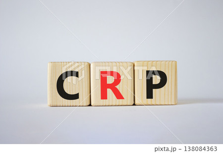 CRP - C-Reactive Protein Test symbol. Wooden cubes with word CRP. Beautiful white background. Medical and C-Reactive Protein Test concept. Copy space. 138084363