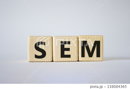 SEM - Search Engine Marketing symbol. Wooden cubes with words SEM. Beautiful white background. Business and SEM concept. Copy space. 138084365