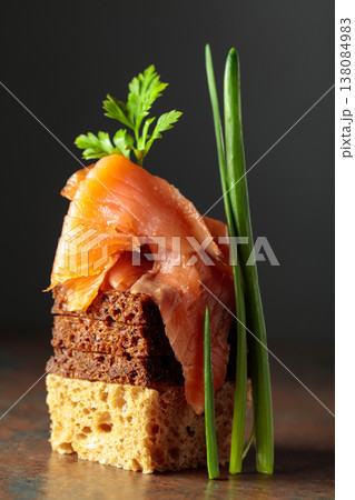 Open sandwich with smoked salmon. 138084983
