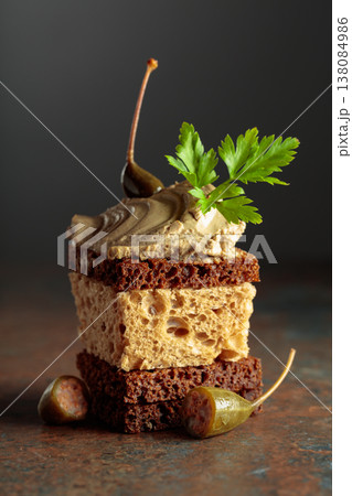 Bread with pate, capers, and fresh parsley. Bread with pate, capers, and fresh parsley. 138084986