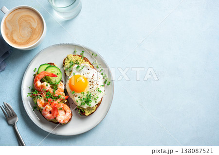 Avocado Shrimp and Fried Egg Breakfast Sandwiches 138087521