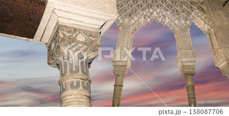 Arches in Islamic (Moorish) style (against the sunset) in Alhambra, Granada, Spain Arches in Islamic (Moorish) style (against the sunset) in Alhambra, Granada, Spain 138087706