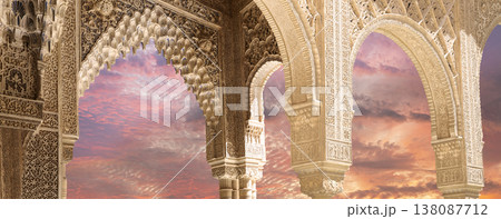 Arches in Islamic (Moorish) style (against the sunset) in Alhambra, Granada, Spain Arches in Islamic (Moorish) style (against the sunset) in Alhambra, Granada, Spain 138087712