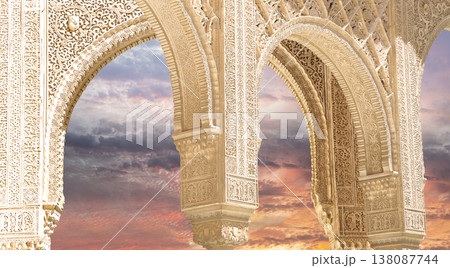 Arches in Islamic (Moorish) style (against the sunset) in Alhambra, Granada, Spain Arches in Islamic (Moorish) style (against the sunset) in Alhambra, Granada, Spain 138087744