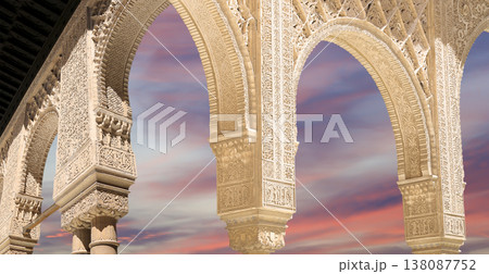 Arches in Islamic (Moorish) style (against the sunset) in Alhambra, Granada, Spain Arches in Islamic (Moorish) style (against the sunset) in Alhambra, Granada, Spain 138087752