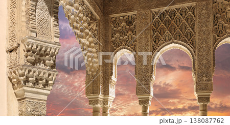 Arches in Islamic (Moorish) style (against the sunset) in Alhambra, Granada, Spain 138087762