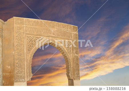 Arches in Islamic (Moorish) style (against the sunset) in Alhambra, Granada, Spain Arches in Islamic (Moorish) style (against the sunset) in Alhambra, Granada, Spain 138088216