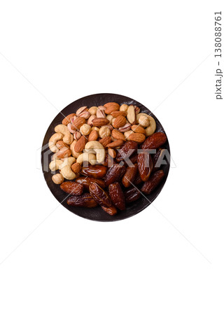 Dried dates on a ceramic plate for Ramadan or Iftar. Dates fruit as a background 138088761