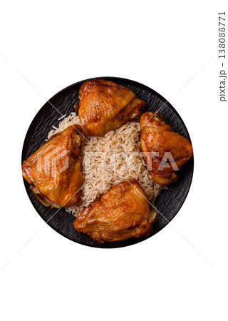 Kabsa or haneeth, an Arabic dish with rice and chicken, salt, and spices. Kabsa or haneeth Kabsa or haneeth, an Arabic dish with rice and chicken, salt, and spices. Kabsa or haneeth 138088771