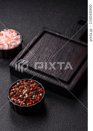 An empty wooden cutting board with cutlery on a kitchen counter. A wooden cutting board An empty wooden cutting board with cutlery on a kitchen counter. A wooden cutting board 138088900
