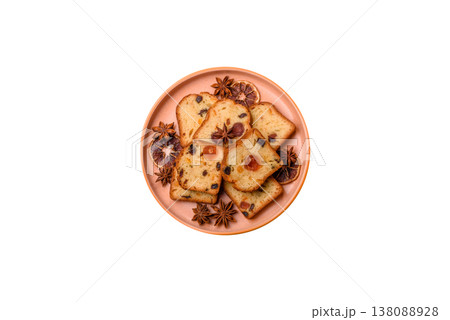 Fruit cake, a dessert with cherries, plums, and raisins for a festive Christmas table. Fruit cake Fruit cake, a dessert with cherries, plums, and raisins for a festive Christmas table. Fruit cake 138088928