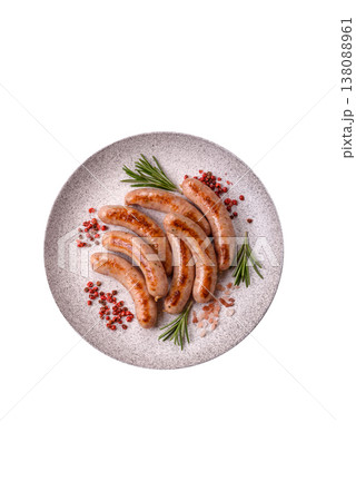 Grilled pork or chicken sausages, smoked fried food with salt and spices. Grilled sausages 138088961