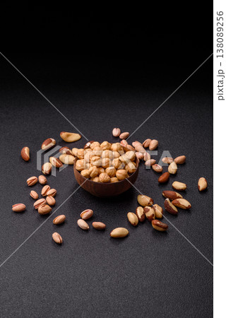 Whole peeled hazelnuts, roasted or raw, as an ingredient for healthy food. Hazelnuts as a background Whole peeled hazelnuts, roasted or raw, as an ingredient for healthy food. Hazelnuts as a background 138089256