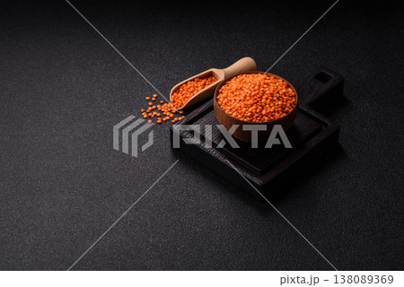 Raw red lentils as a source of protein for a healthy vegan meal. Red lentils Raw red lentils as a source of protein for a healthy vegan meal. Red lentils 138089369