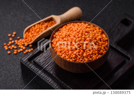 Raw red lentils as a source of protein for a healthy vegan meal. Red lentils Raw red lentils as a source of protein for a healthy vegan meal. Red lentils 138089375