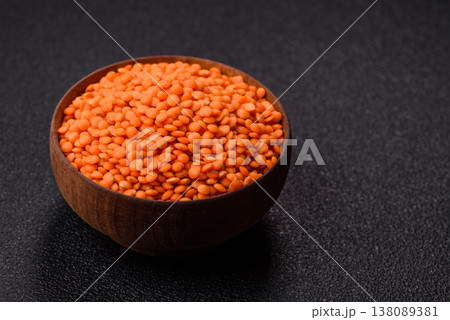Raw red lentils as a source of protein for a healthy vegan meal. Red lentils Raw red lentils as a source of protein for a healthy vegan meal. Red lentils 138089381