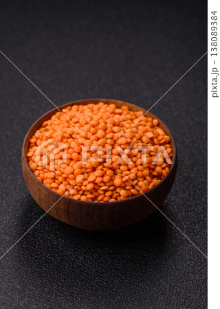 Raw red lentils as a source of protein for a healthy vegan meal. Red lentils Raw red lentils as a source of protein for a healthy vegan meal. Red lentils 138089384
