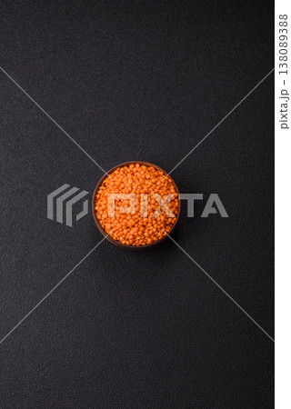 Raw red lentils as a source of protein for a healthy vegan meal. Red lentils Raw red lentils as a source of protein for a healthy vegan meal. Red lentils 138089388