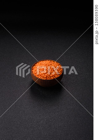 Raw red lentils as a source of protein for a healthy vegan meal. Red lentils Raw red lentils as a source of protein for a healthy vegan meal. Red lentils 138089390