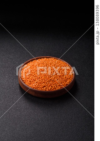 Raw red lentils as a source of protein for a healthy vegan meal. Red lentils Raw red lentils as a source of protein for a healthy vegan meal. Red lentils 138089396