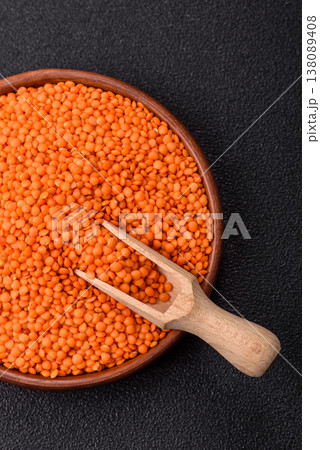 Raw red lentils as a source of protein for a healthy vegan meal. Red lentils Raw red lentils as a source of protein for a healthy vegan meal. Red lentils 138089408