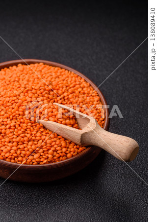 Raw red lentils as a source of protein for a healthy vegan meal. Red lentils Raw red lentils as a source of protein for a healthy vegan meal. Red lentils 138089410