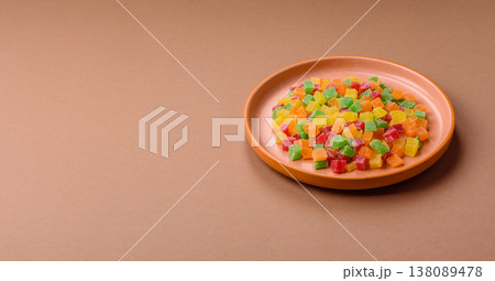 Candied fruit in colorful cubes as an ingredient for baked goods and sweets. Candied fruit 138089478