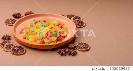 Candied fruit in colorful cubes as an ingredient for baked goods and sweets. Candied fruit Candied fruit in colorful cubes as an ingredient for baked goods and sweets. Candied fruit 138089487