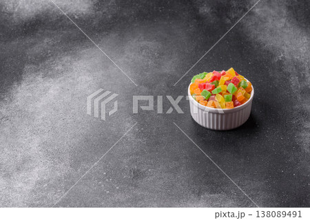 Candied fruit in colorful cubes as an ingredient for baked goods and sweets. Candied fruit Candied fruit in colorful cubes as an ingredient for baked goods and sweets. Candied fruit 138089491