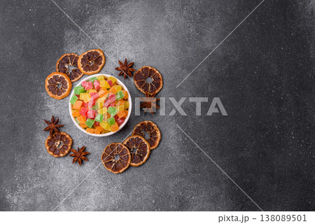Candied fruit in colorful cubes as an ingredient for baked goods and sweets. Candied fruit Candied fruit in colorful cubes as an ingredient for baked goods and sweets. Candied fruit 138089501