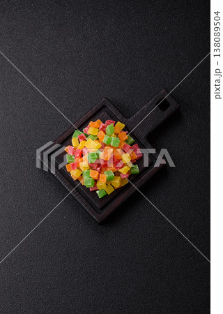 Candied fruit in colorful cubes as an ingredient for baked goods and sweets. Candied fruit 138089504