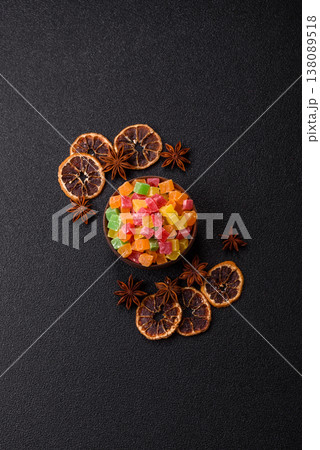 Candied fruit in colorful cubes as an ingredient for baked goods and sweets. Candied fruit Candied fruit in colorful cubes as an ingredient for baked goods and sweets. Candied fruit 138089518