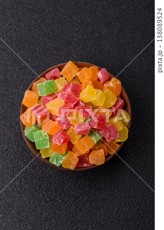 Candied fruit in colorful cubes as an ingredient for baked goods and sweets. Candied fruit Candied fruit in colorful cubes as an ingredient for baked goods and sweets. Candied fruit 138089524