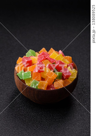 Candied fruit in colorful cubes as an ingredient for baked goods and sweets. Candied fruit Candied fruit in colorful cubes as an ingredient for baked goods and sweets. Candied fruit 138089525