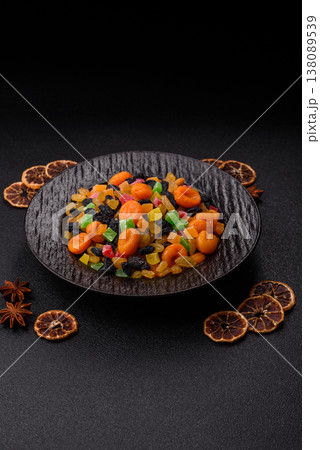 Dried apricots, raisins, and candied fruits as ingredients for baked goods and sweets. Dried fruits 138089539