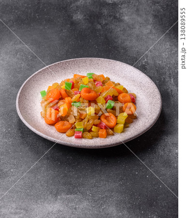 Dried apricots, raisins, and candied fruits as ingredients for baked goods and sweets. Dried fruits 138089555