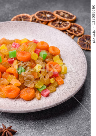 Dried apricots, raisins, and candied fruits as ingredients for baked goods and sweets. Dried fruits 138089560