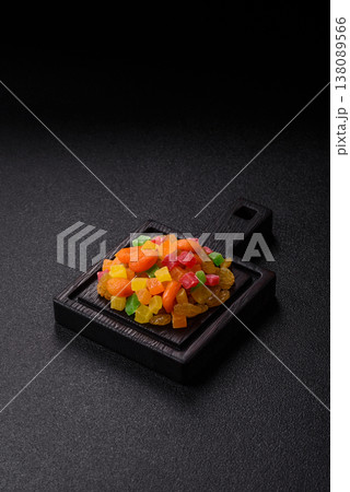 Dried apricots, raisins, and candied fruits as ingredients for baked goods and sweets. Dried fruits Dried apricots, raisins, and candied fruits as ingredients for baked goods and sweets. Dried fruits 138089566